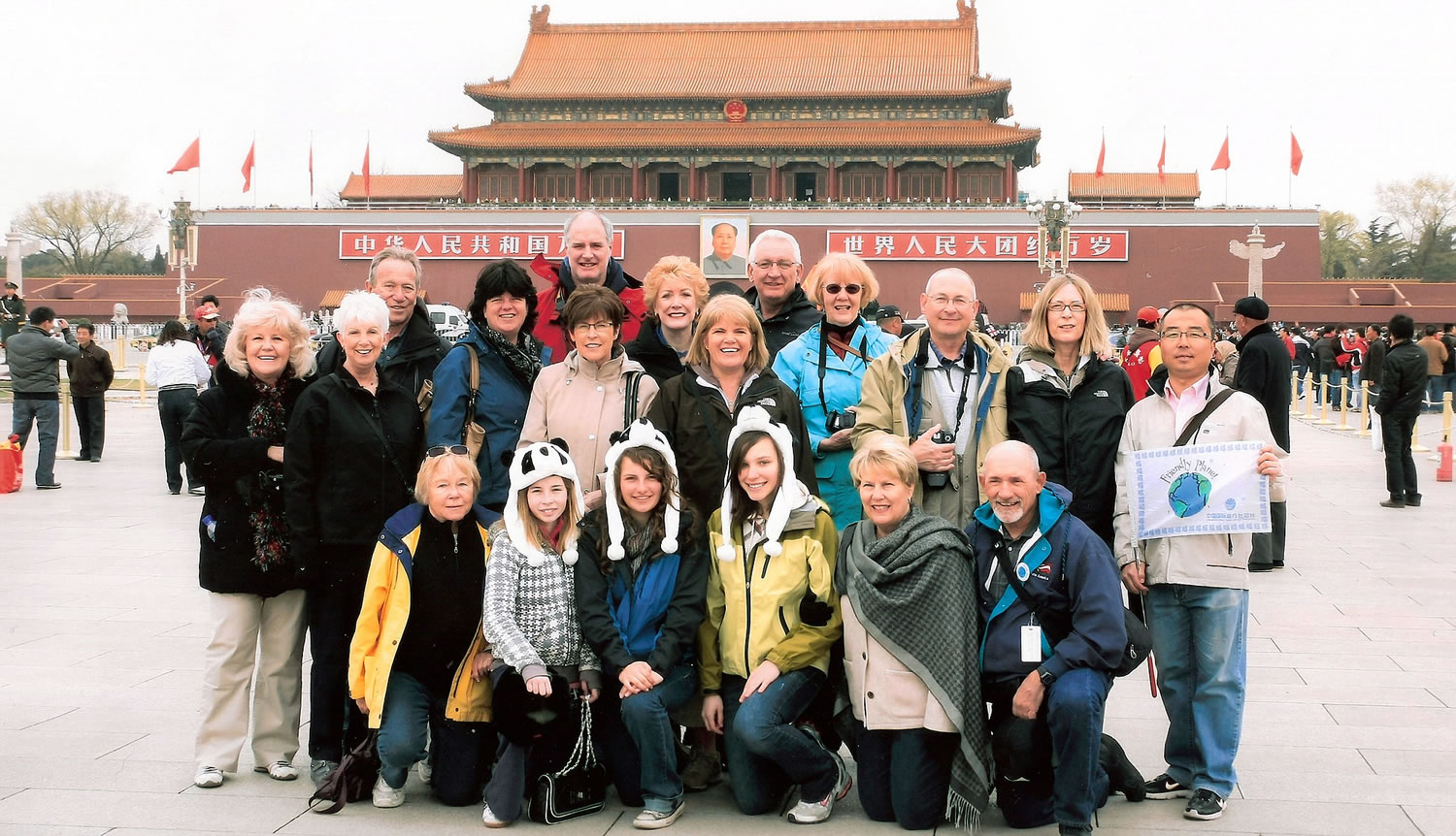 Friendly Planet Travel participants pose in Tiananmen Square in Beijing.