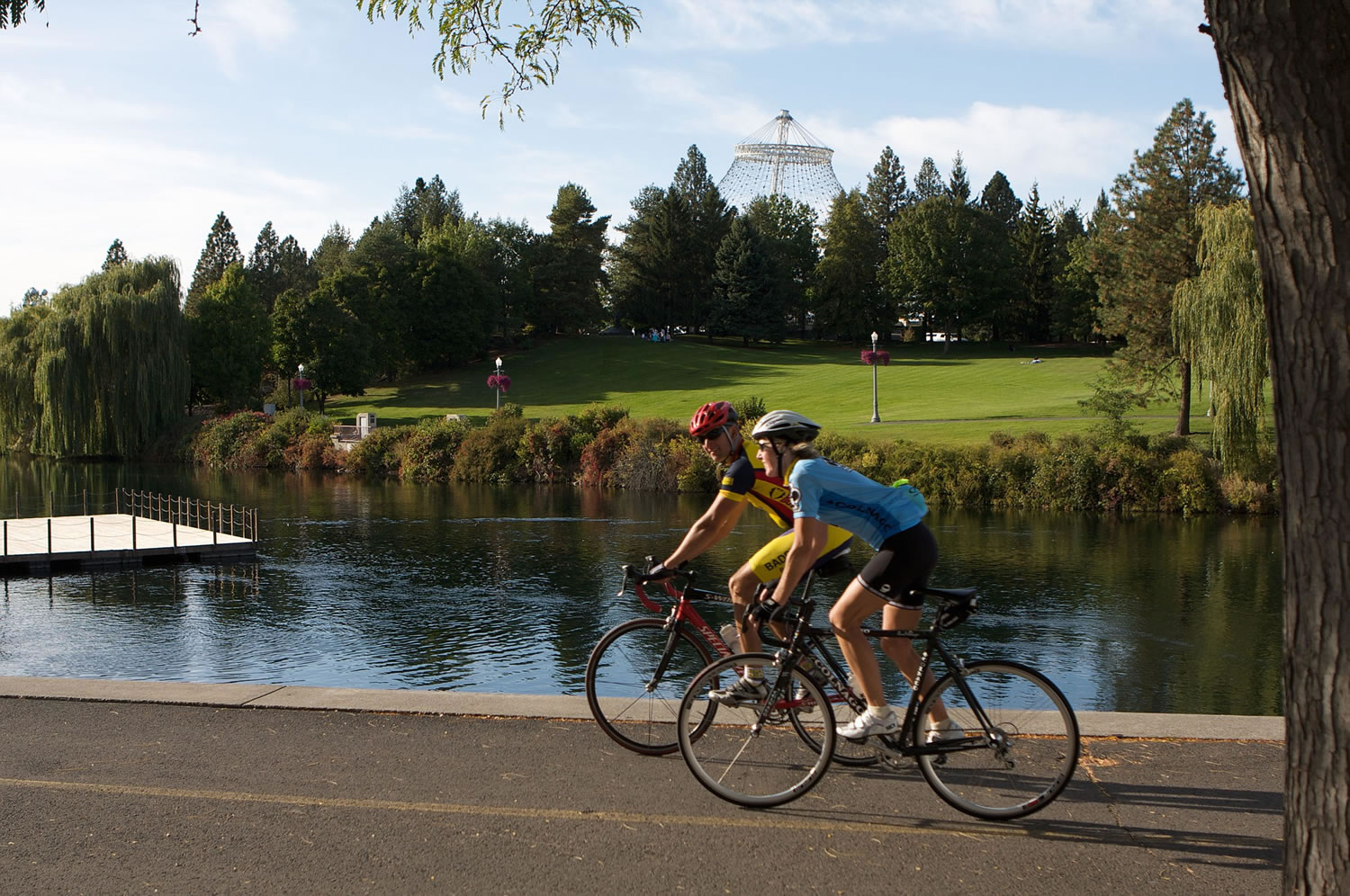 Bike riders along a section of the Centennial Trail, a 60-mile paved biking and hiking trail that connects Spokane with Coeur d'Alene, Idaho, and Lake Coeur d'Alene.