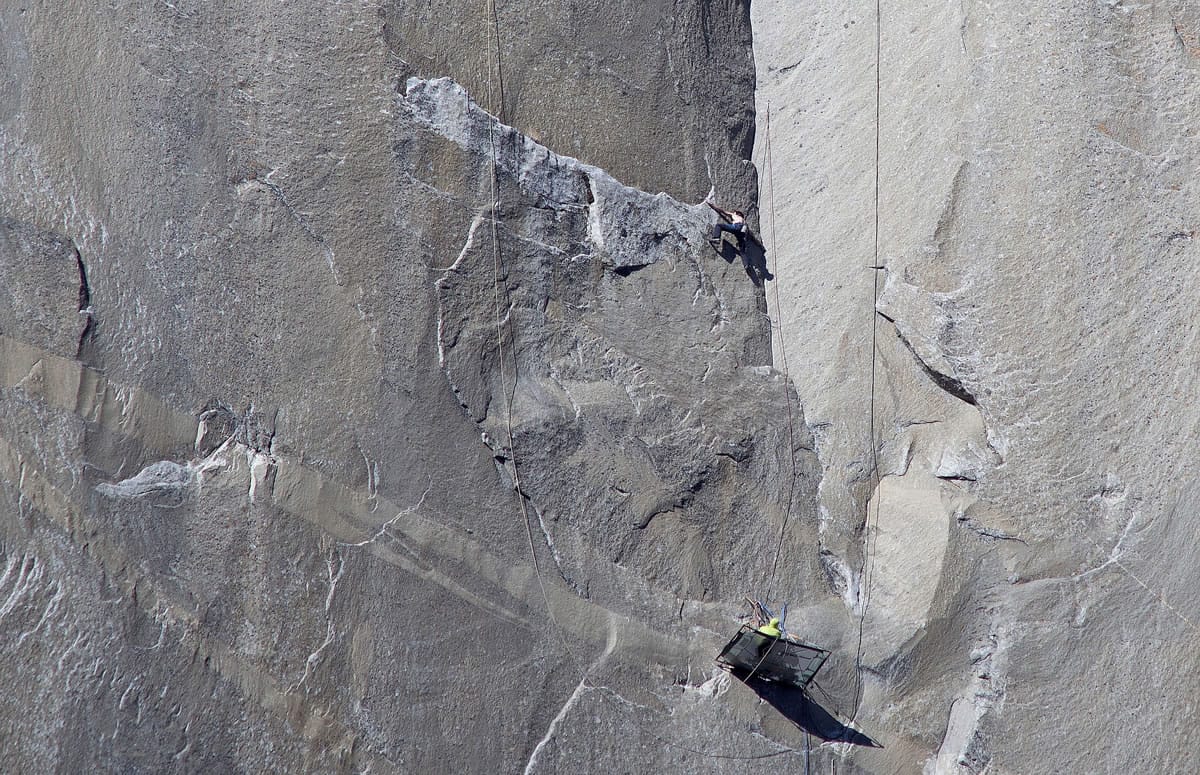 Tommy Caldwell, bottom, watches as Kevin Jorgeson climbs what has been called the hardest rock climb in the world: a free climb of El Capitan, the largest monolith of granite in the world, a half-mile section of exposed granite in California's Yosemite National Park. El Capitan rises more than 3,000 feet above the Yosemite Valley floor.