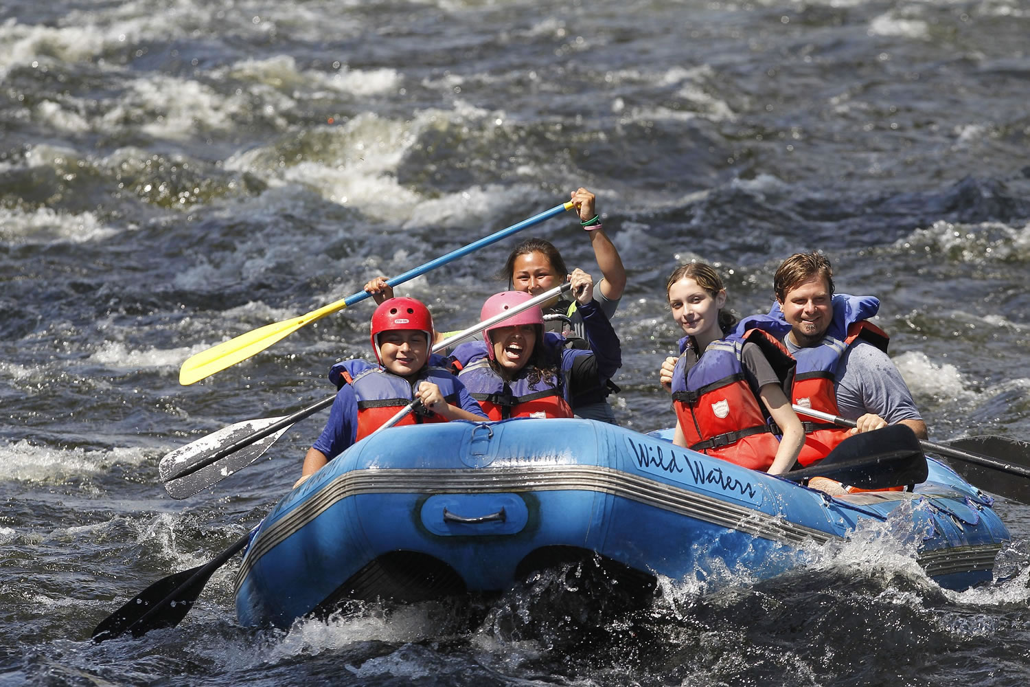 Whitewater rafters going down the Sacandaga River in Lake Luzerne, N.Y.