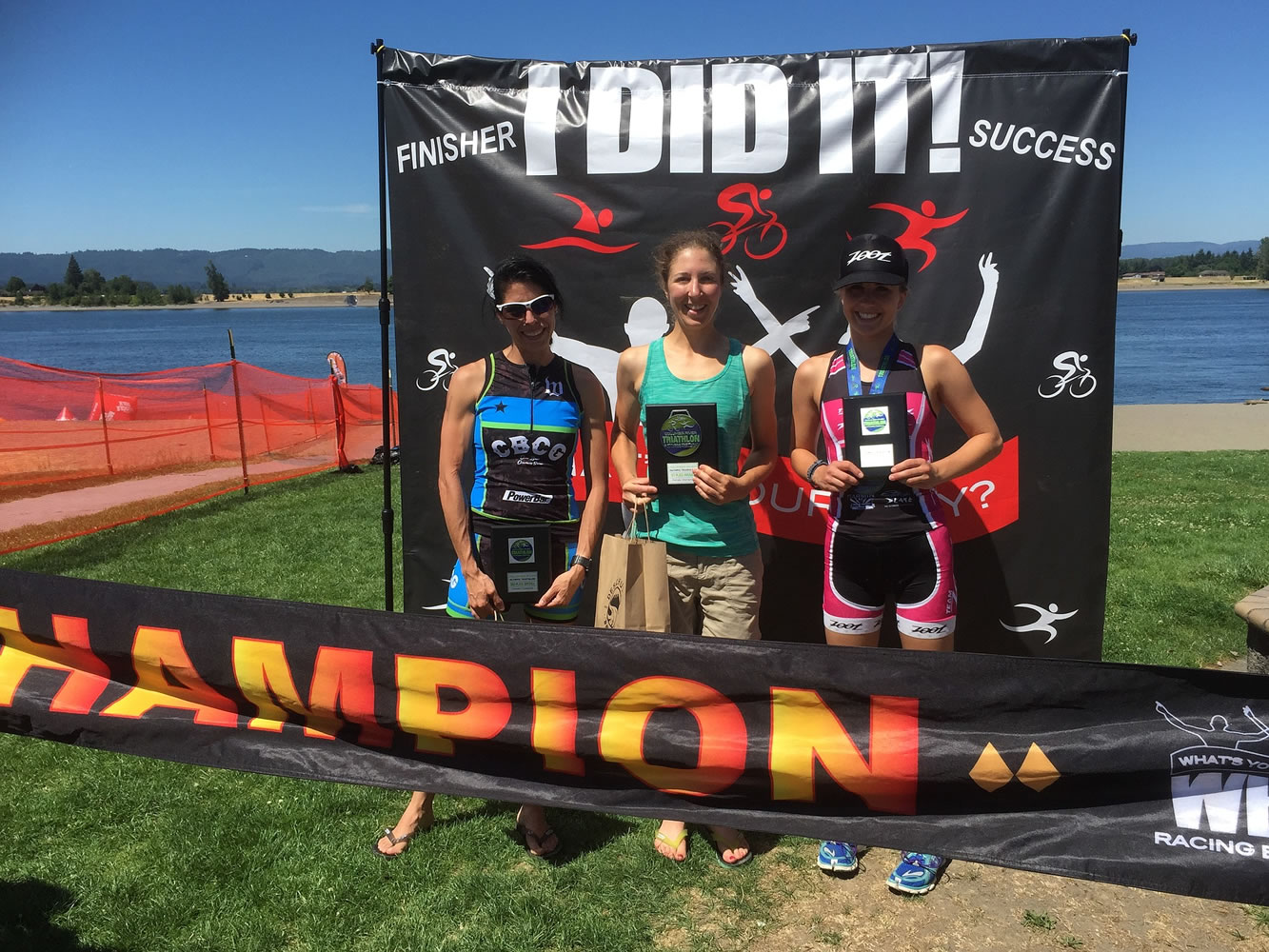 Stefanie Bergh, 33, of White Salmon (center) was the women's winner of the Columbia River Olympic Triathlon and third overall with a time of 2 hours, 10 minutes, 35 seconds.