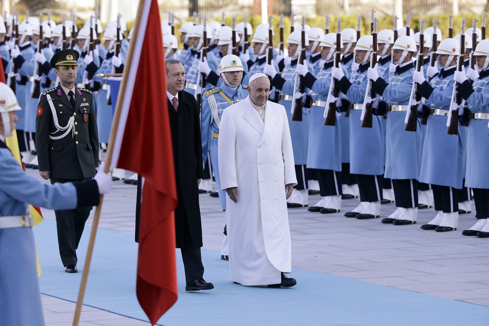 Pope Francis is welcomed by Turkish President Recep Tayyip Erdogan on Friday at the presidential palace in Ankara.