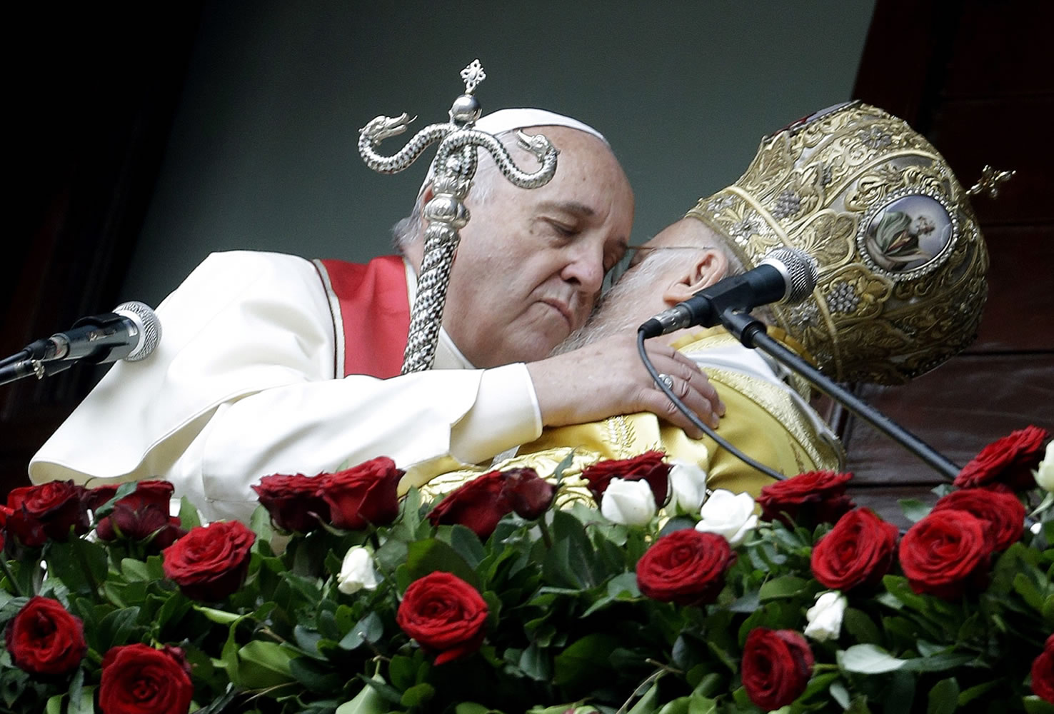 Pope Francis, left, hugs Ecumenical Patriarch Bartholomew I after a holy liturgy Sunday at the Patriarchal Church of St. George in Istanbul.