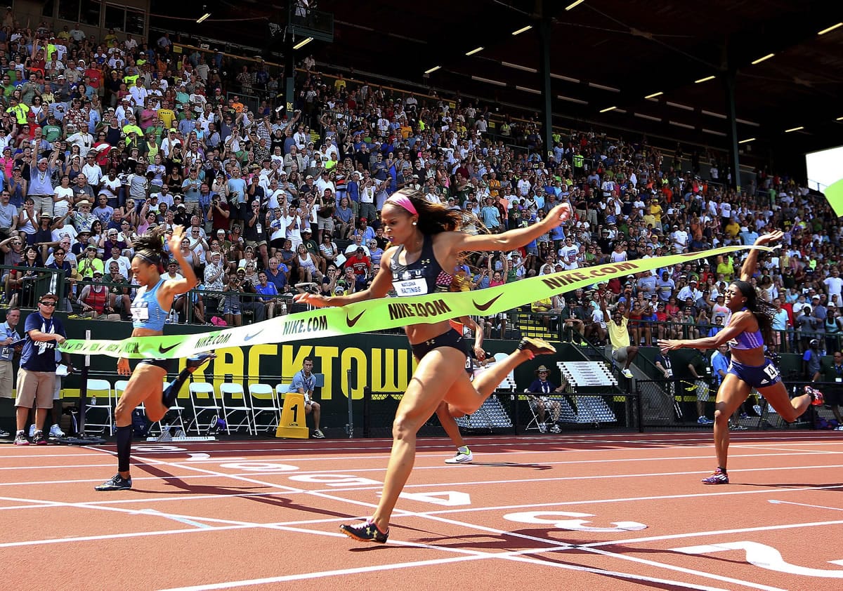 Allyson Felix, left, beats Natasha Hastings, right, in the women's 400 meters at the U.S. track and field championships in Eugene, Ore., Saturday, June 27, 2015.