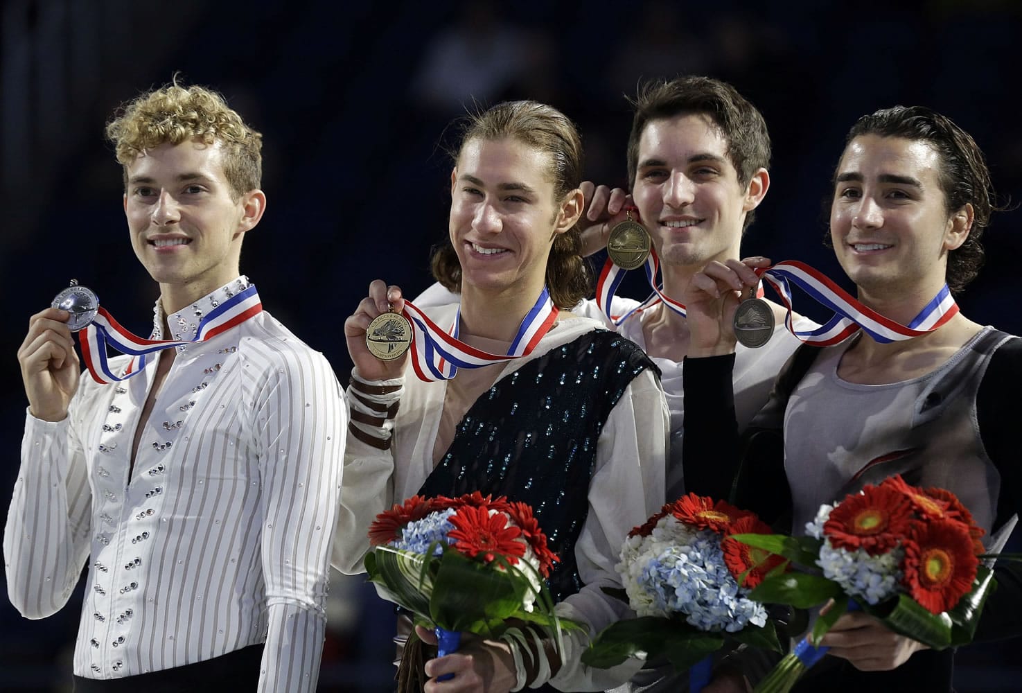 Top winners of the men's competition from left, Adam Rippon, second place; Jason Brown, first place; Joshua Farris, third place and Max Aaron, fourth place, hold their medals during the awards ceremony in the U.S. Figure Skating Championships in Greensboro, N.C., Sunday, Jan. 25, 2015.