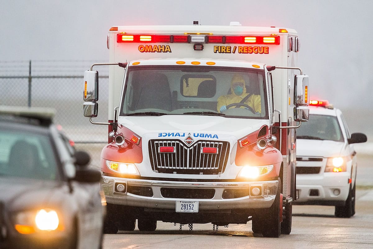 An ambulance transports Dr.