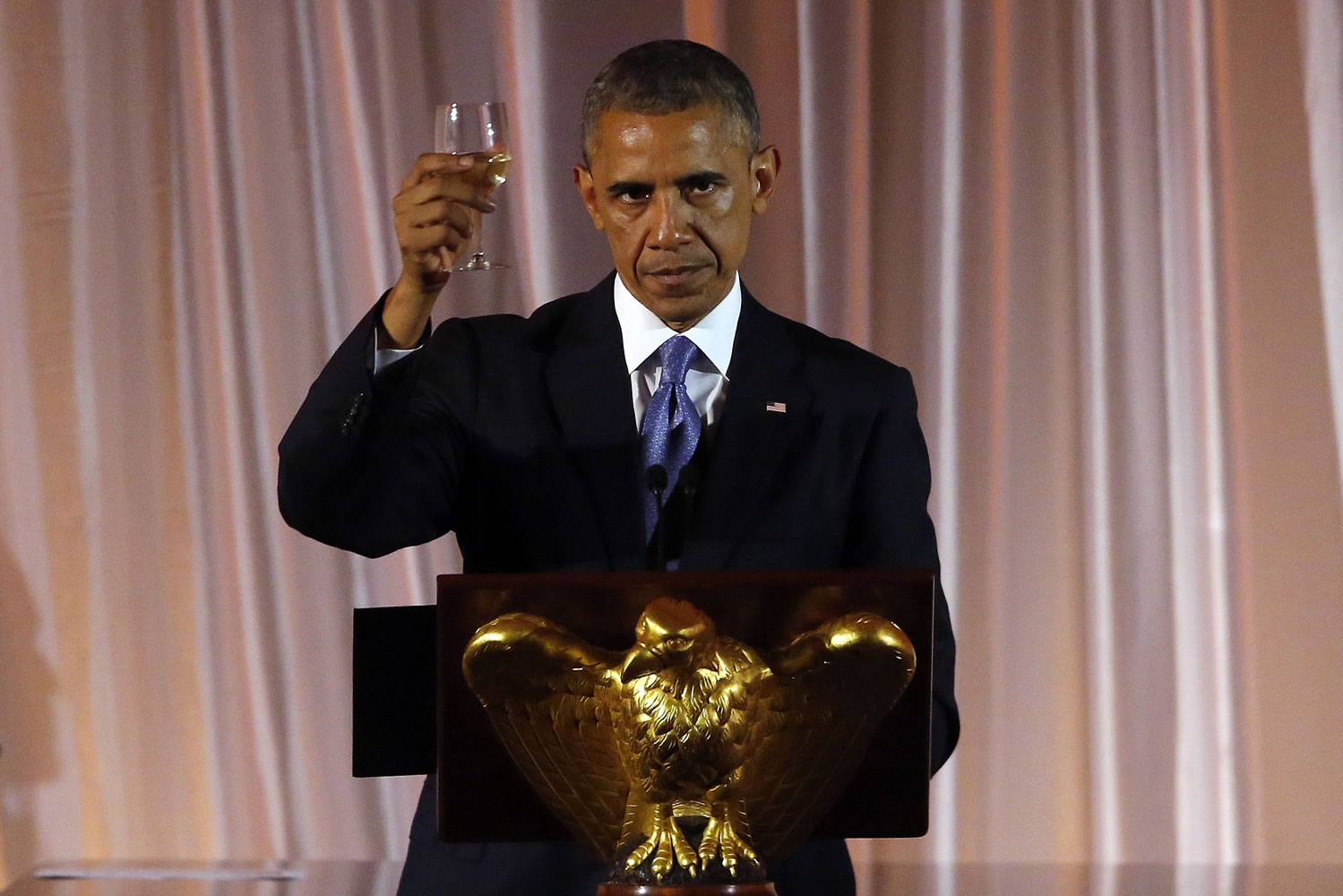 President Barack Obama offers a toast at a dinner for the U.S.
