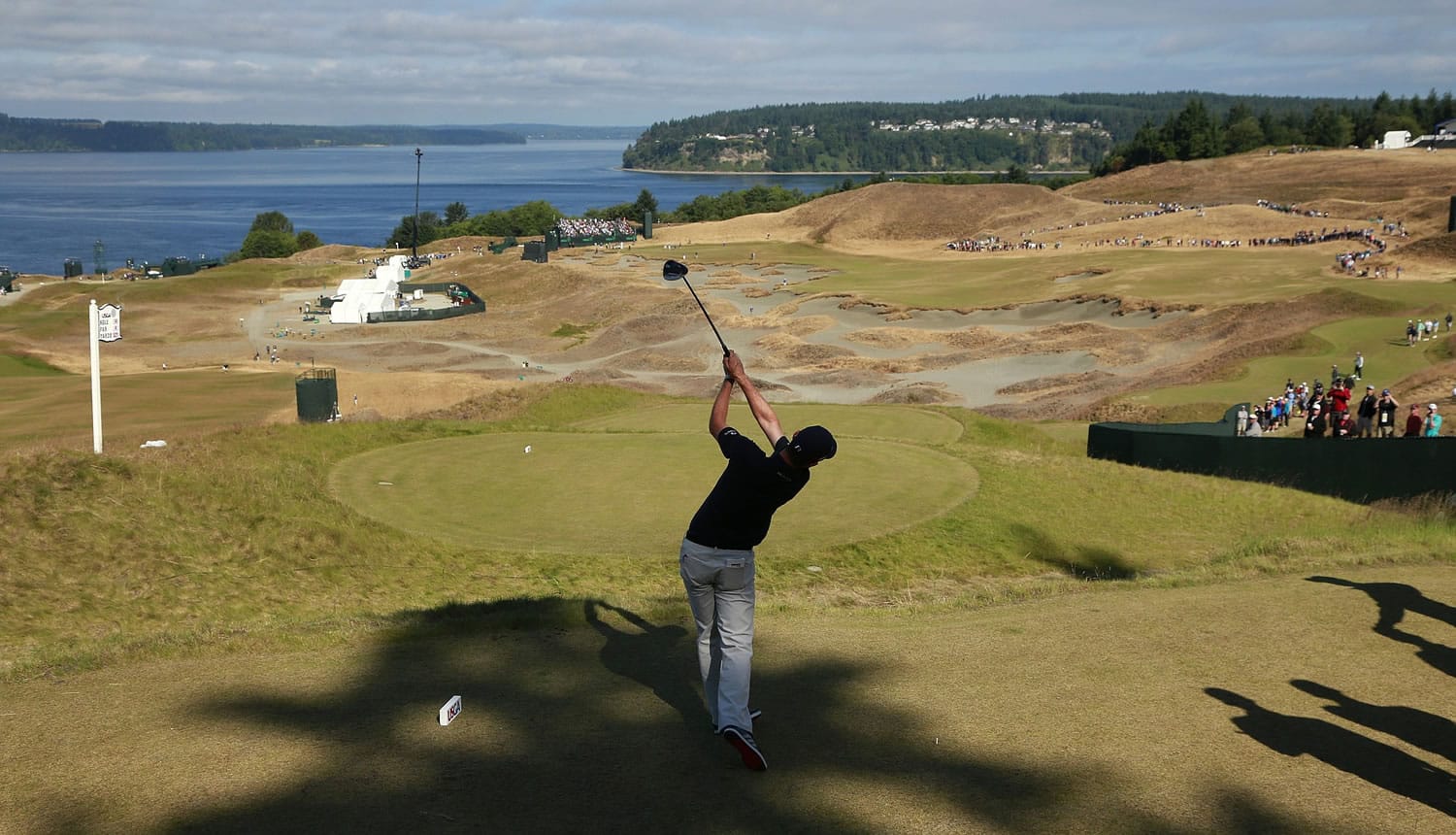 Justin Rose, of England, watches his tee shot on the 14th hole during a practice round for the U.S. Open golf tournament at Chambers Bay on Wednesday, June 17, 2015 in University Place.