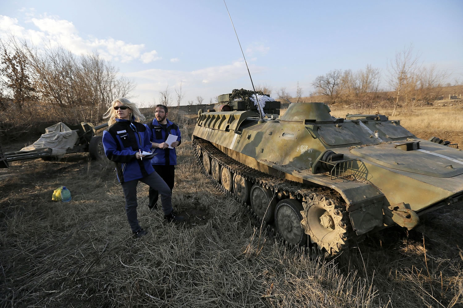 OSCE monitors inspect Ukrainian armored vehicles and cannons Friday in the town of  Druzhkivka, east Ukraine.