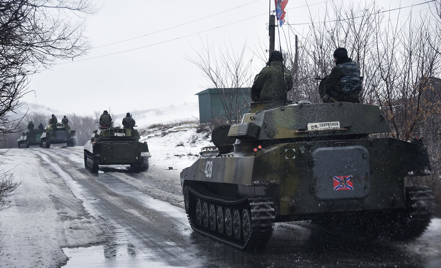 A pro-Russian armored vehicle moves Wednesday toward Slovyanoserbsk, eastern Ukraine.