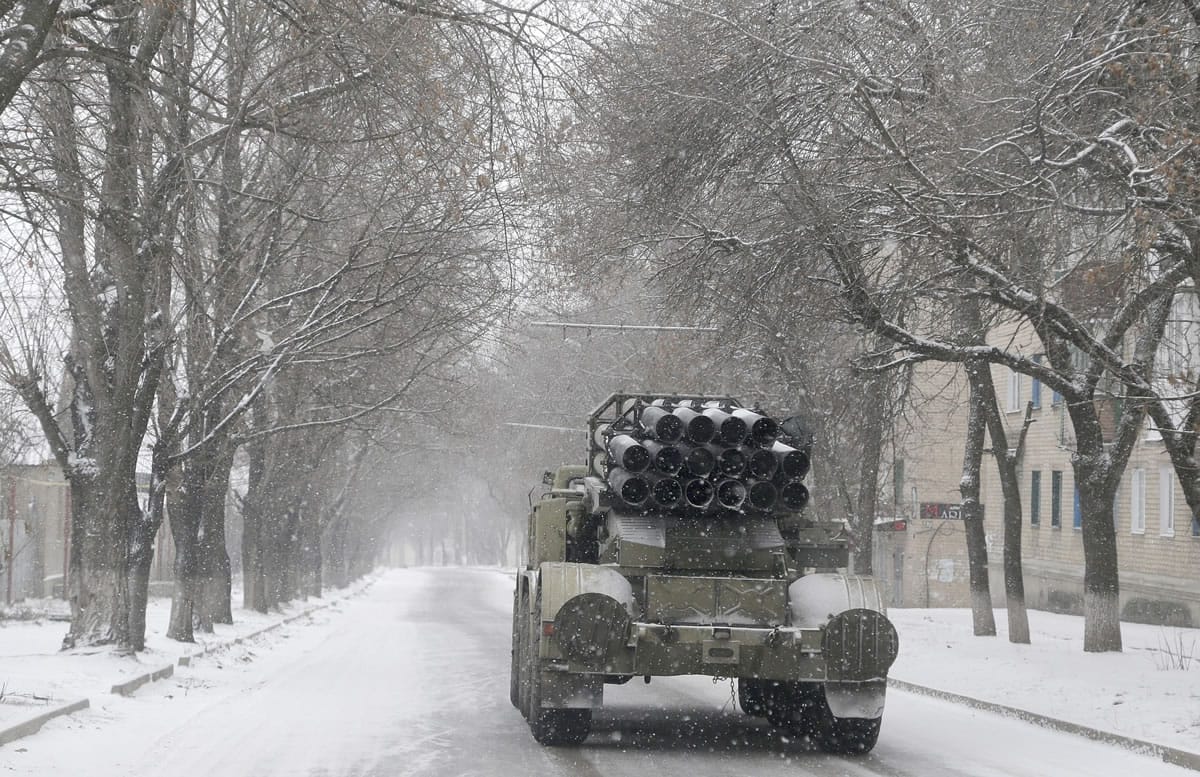 An Ukrainian truck with a &quot;Smerch&quot; missile launcher drives Monday through the streets of Artemivsk, Ukraine.