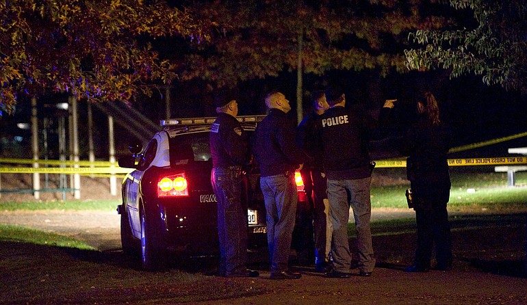 Police investigate a shooting at Jaggy Road Park late Thursday.