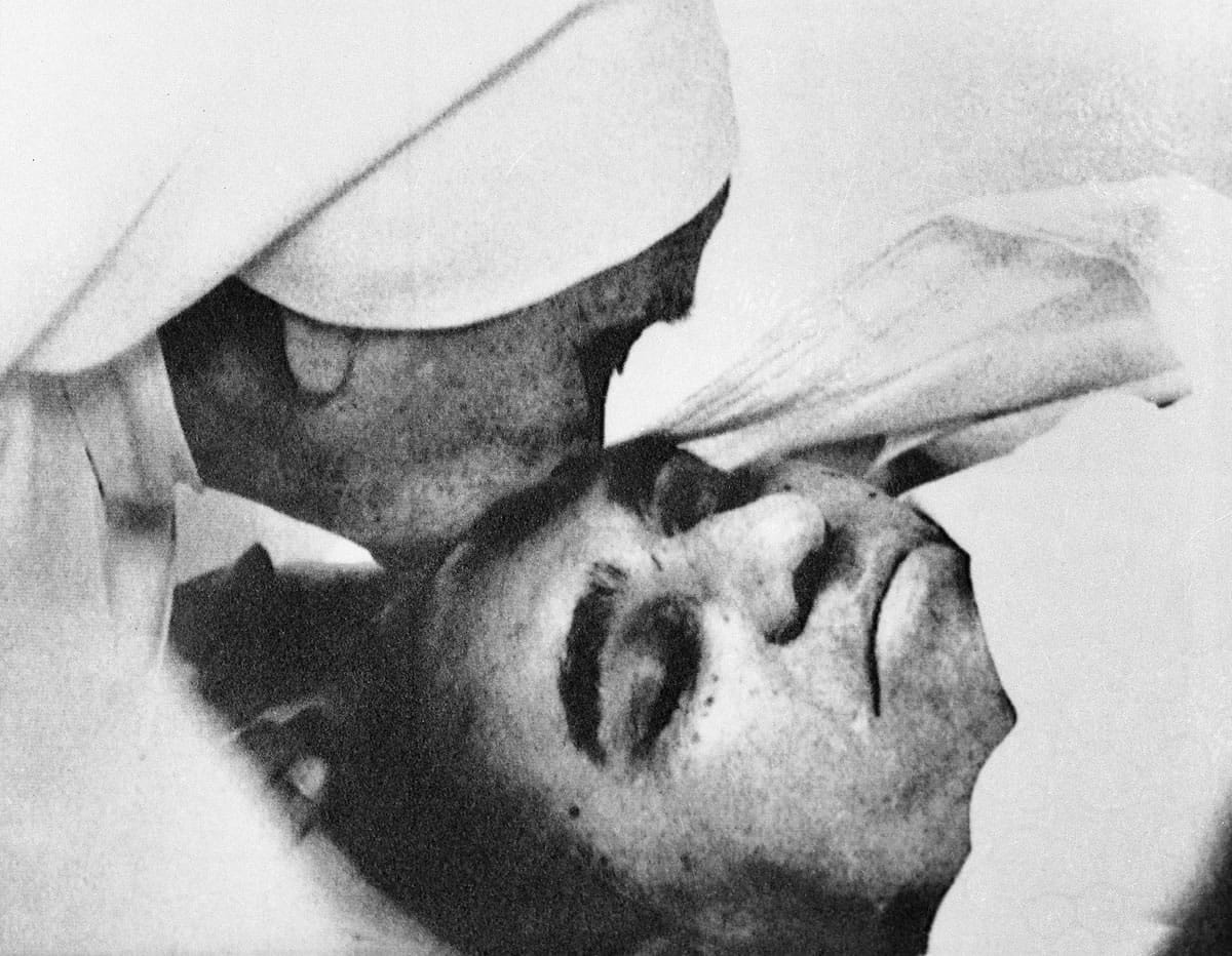 Associated Press files
A nun plants a kiss on the forehead of Archbishop Oscar Arnulfo Romero of El Salvador on March 23, 1980, at the Hospital of Divine Providence. Pope Francis decreed Tuesday that the slain Salvadoran archbishop was killed in 1980 out of hatred for his Catholic faith, approving a martyrdom declaration that sets the stage for his beatification.