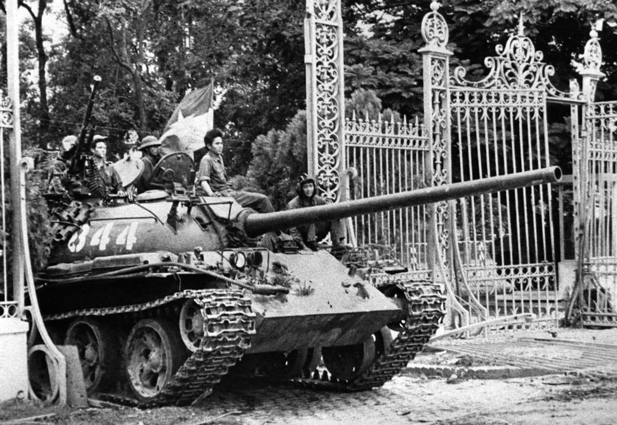 Associated Press files
A North Vietnamese tank rolls through the gates of the Presidential Palace in Saigon on April 30, 1975, signifying the fall of South Vietnam. The city is now known as Ho Chi Minh City.