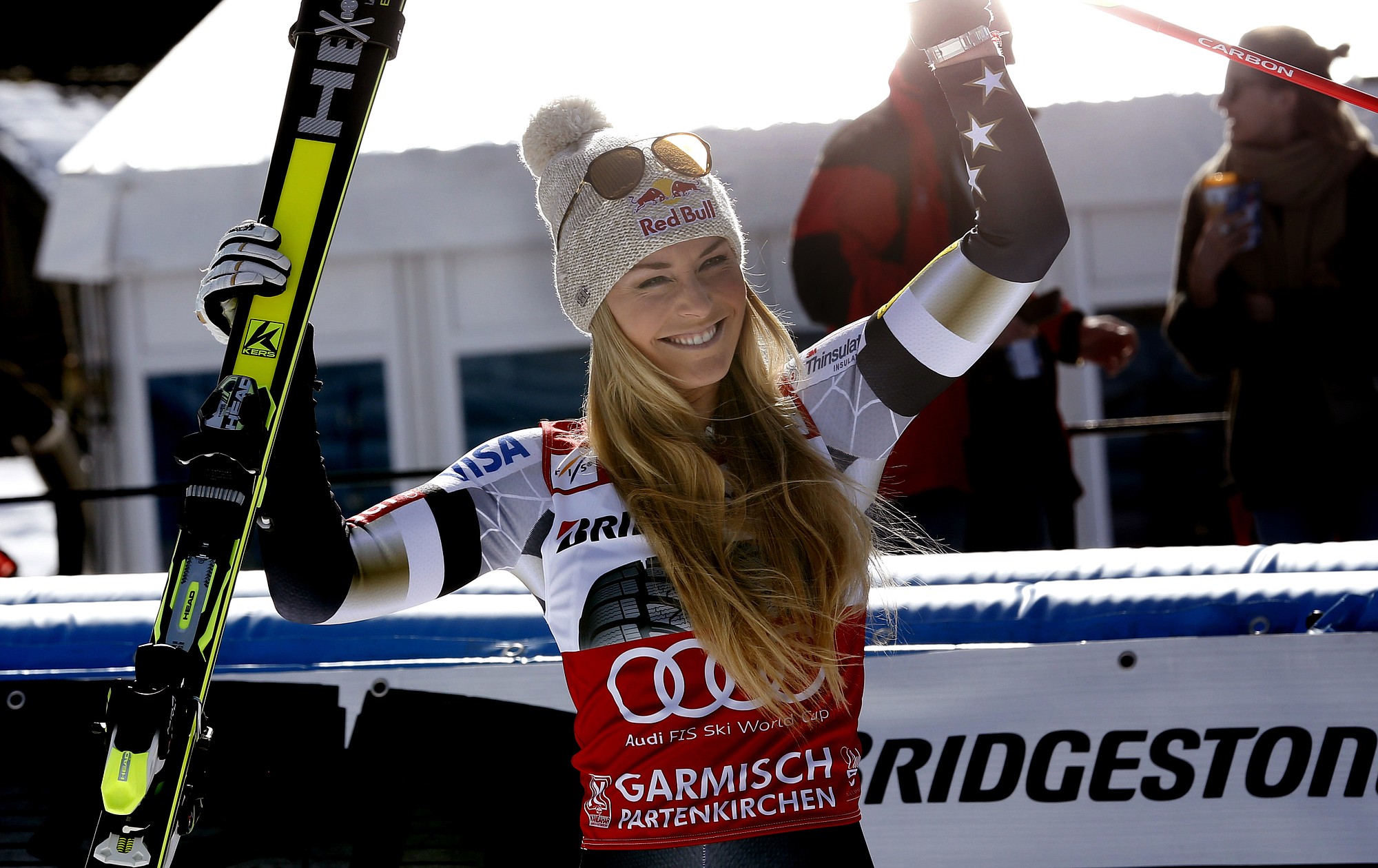 Lindsey Vonn, of the United States, celebrates in the finish area after winning a women's World Cup super-G, in Garmisch-Partenkirchen, Germany, on Sunday, March 8, 2015.