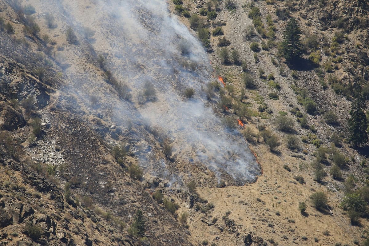 A wildfire burns Friday near Entiat.
