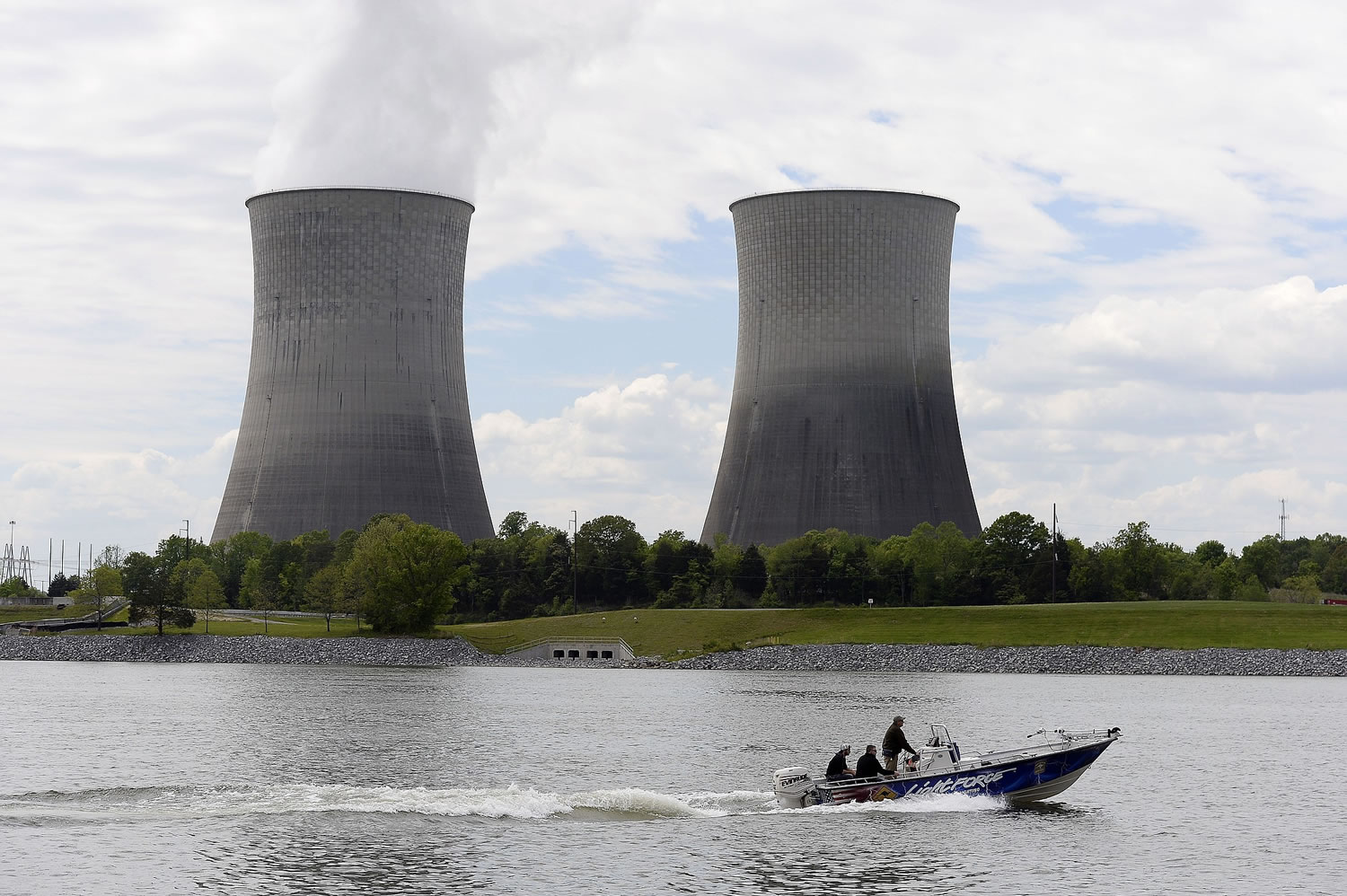 A boat travels on the Tennessee River near the Watts Bar Nuclear Plant on April 29 near Spring City, Tenn.