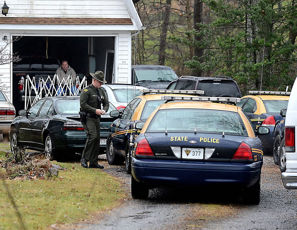 State police arrive at a residence on Sunset Beach Road in Cheat lake area where the second and third  bodies were discovered, shot by the same shooter Jody Hunt of J