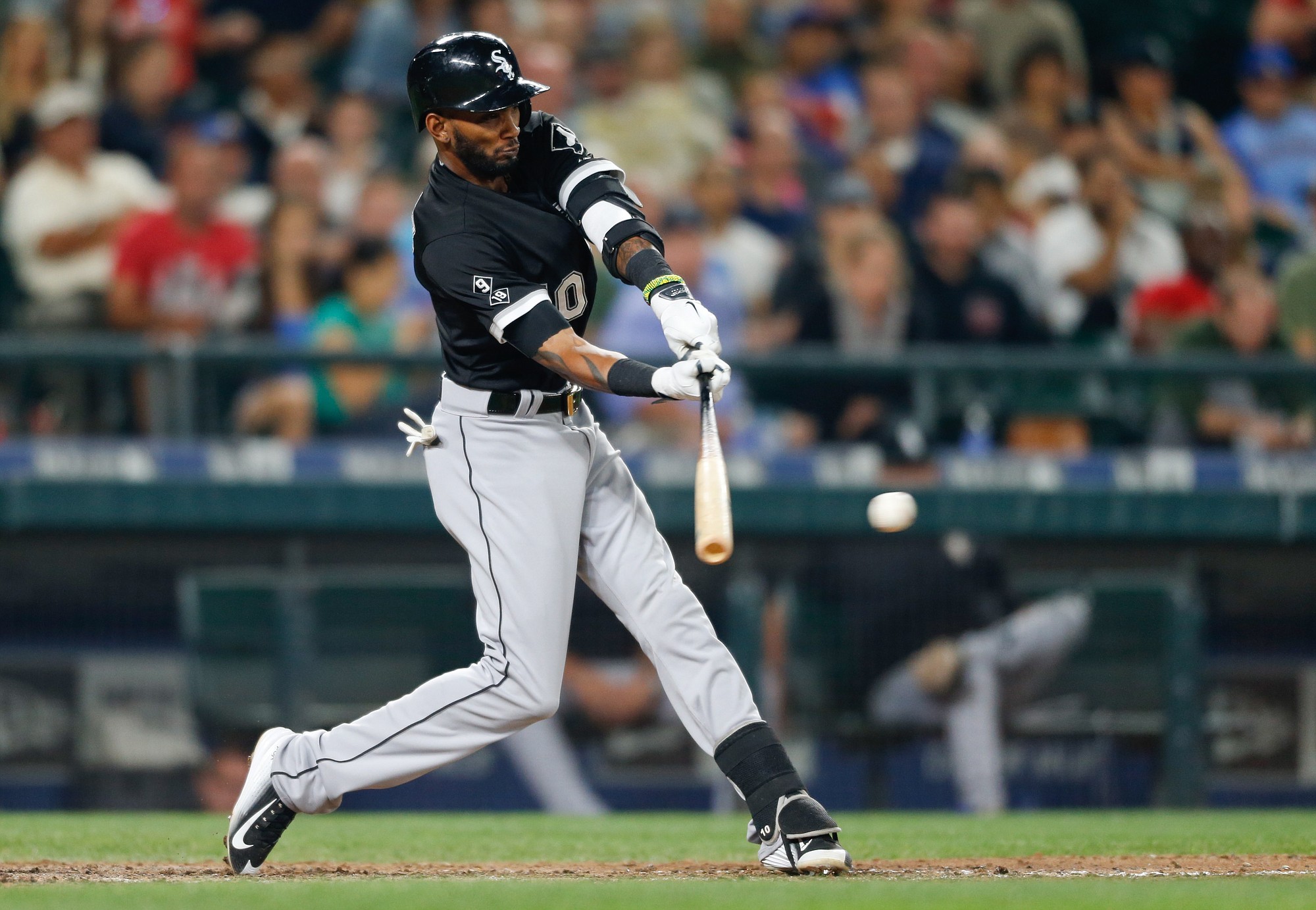 Chicago White Sox's Alexei Ramirez hits an RBI single during the ninth inning in Seattle.