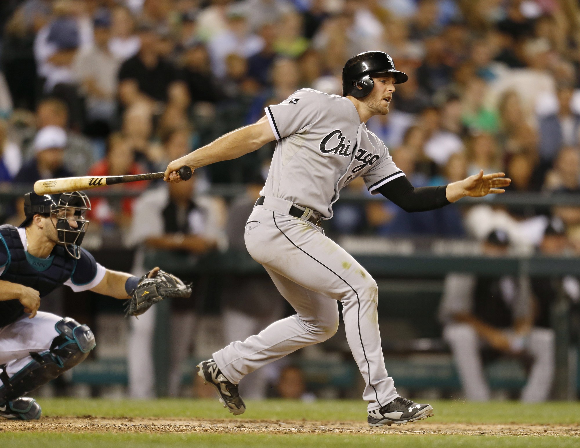 Chicago White Sox's Conor Gillaspie watches his RBI single against the Seattle Mariners during the 10th inning of a baseball game in Seattle on Saturday, Aug. 9, 2014.