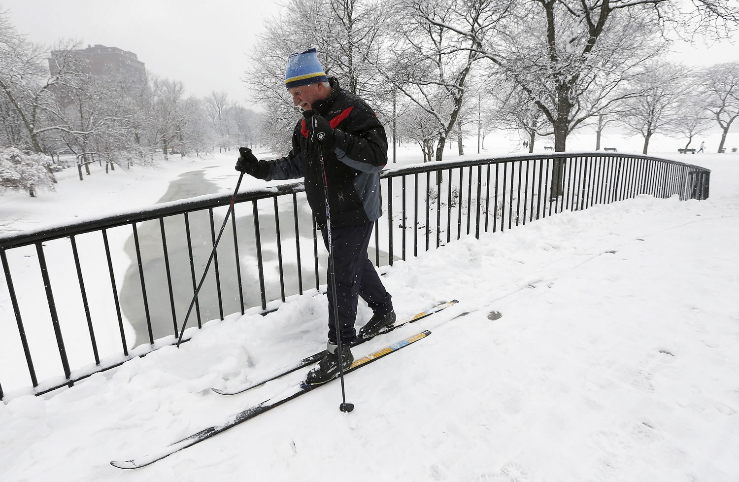 Irv Rosenberg, of Boston, uses cross country skis Saturday in the Esplanade in Boston. A winter storm warning covering Boston and Hartford, Connecticut was in effect through 7 p.m.