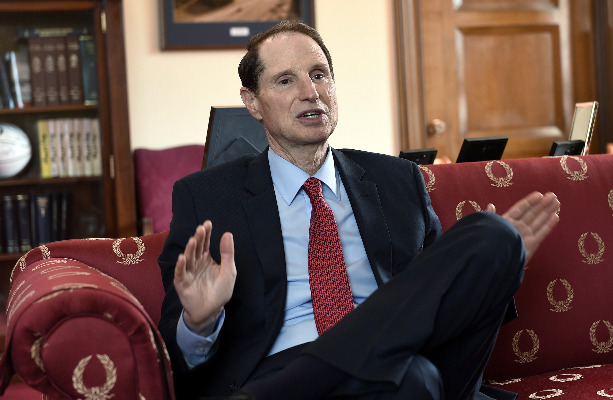 Sen. Ron Wyden, D-Ore., discusses issues Wednesday in his office on Capitol Hill in Washington. Wyden is playing a leading role in some of Congress' toughest debates. The three-term senator is the chief Democratic negotiator on trade legislation that would allow President Barack Obama to negotiate an historic accord with 11 Pacific Rim nations.