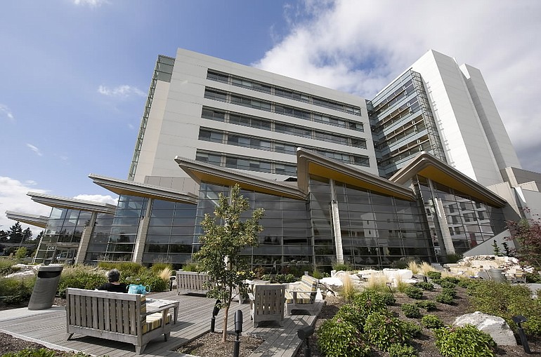 PeaceHealth, which would become the corporate parent of Southwest Washington Medical Center through a merger, is hunting for a Vancouver location for its future headquarters.
