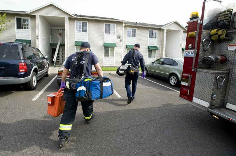 Vancouver Fire Department firefighters respond to a medical call near General Anderson Road in Vancouver.