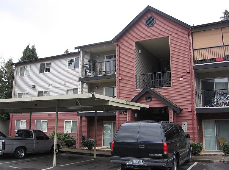 John Eckhart and Alana Higdon are accused of keeping two young children caged in a room at this Vancouver apartment complex.