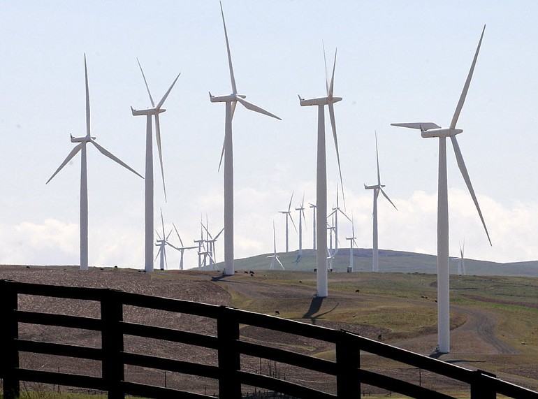 Clark Public Utilities has dodged a battle between wind and water power producers that's unfolding in the Northwest.
