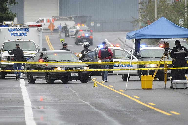 Vancouver police respond to the scene of a shooting in the Fruit Valley area Sept. 7.