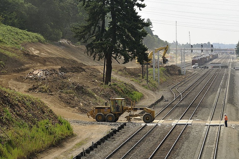 The completion of cleanup efforts at the site of a former scrap metal yard in west Vancouver clears the way for a broader $150 million rail improvement project, part of a state-directed effort to improve freight and passenger mobility.