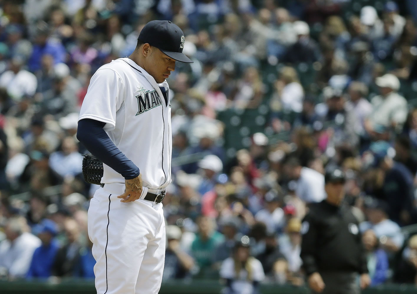 Seattle Mariners starting pitcher Taijuan Walker composes himself on the mound after he gave up a two-run home run to New York Yankees' Brian McCann in the fourth inning of a baseball game, Wednesday, June 3, 2015, in Seattle. (AP Photo/Ted S.