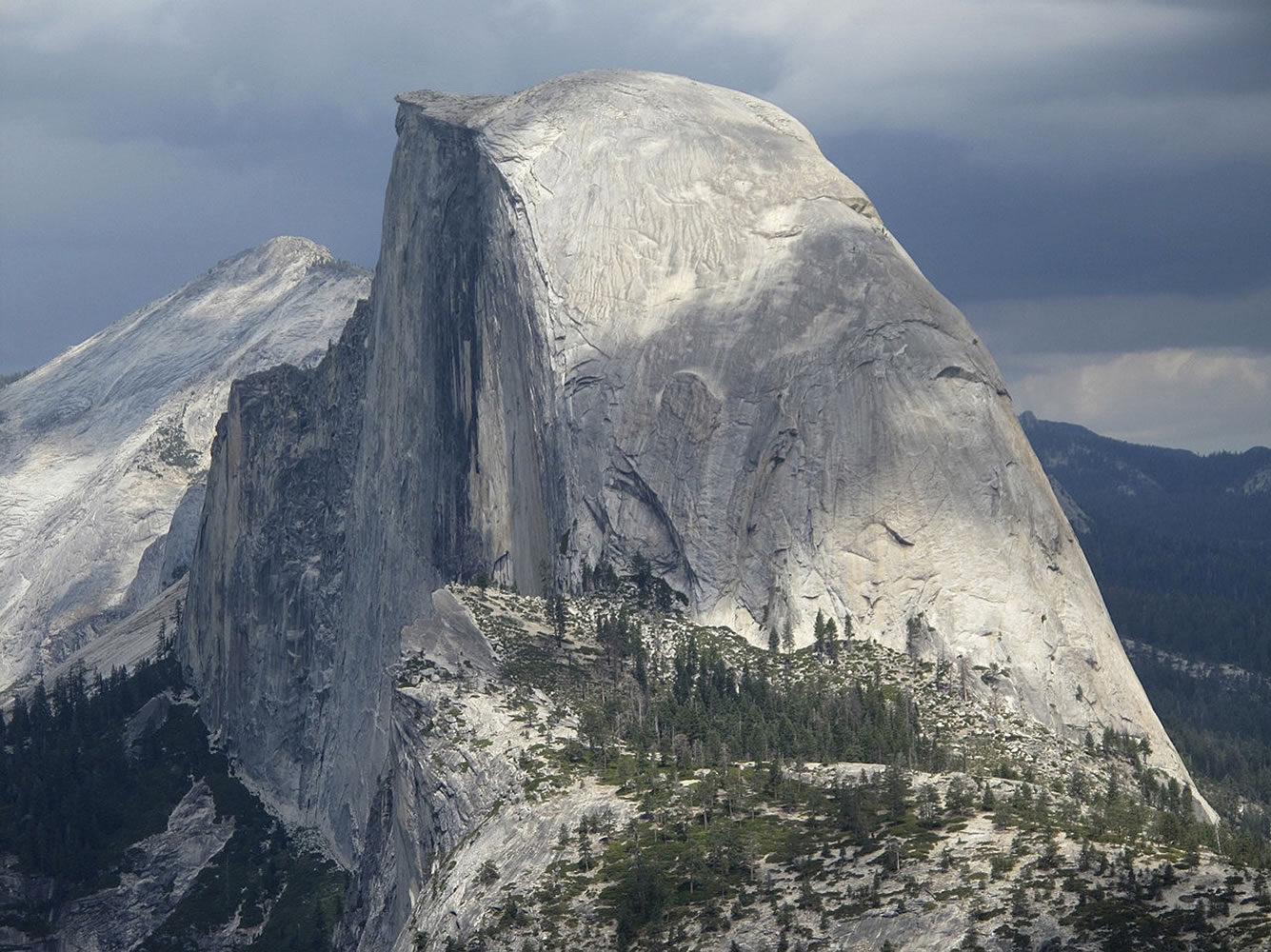 Associated Press files
This August 2011 photo shows a view of Half Dome and Yosemite Valley from Glacier Point at Yosemite National Park, Calif.  A massive sheet of rock has fallen from the vertical face of Half Dome, park officials said Tuesday.