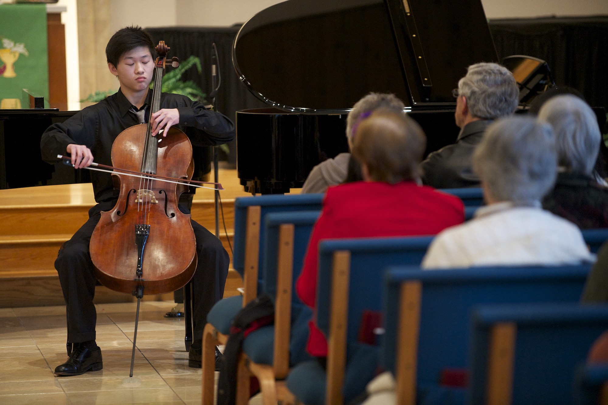 Richard Lu, 15, a sophomore at Skyview High School, plays Cello Concerto in C major (Haydn) at the Vancouver Symphony Orchestra's 20th Young Artists Competition at Trinity Lutheran Church, Sunday, February 16, 2014.