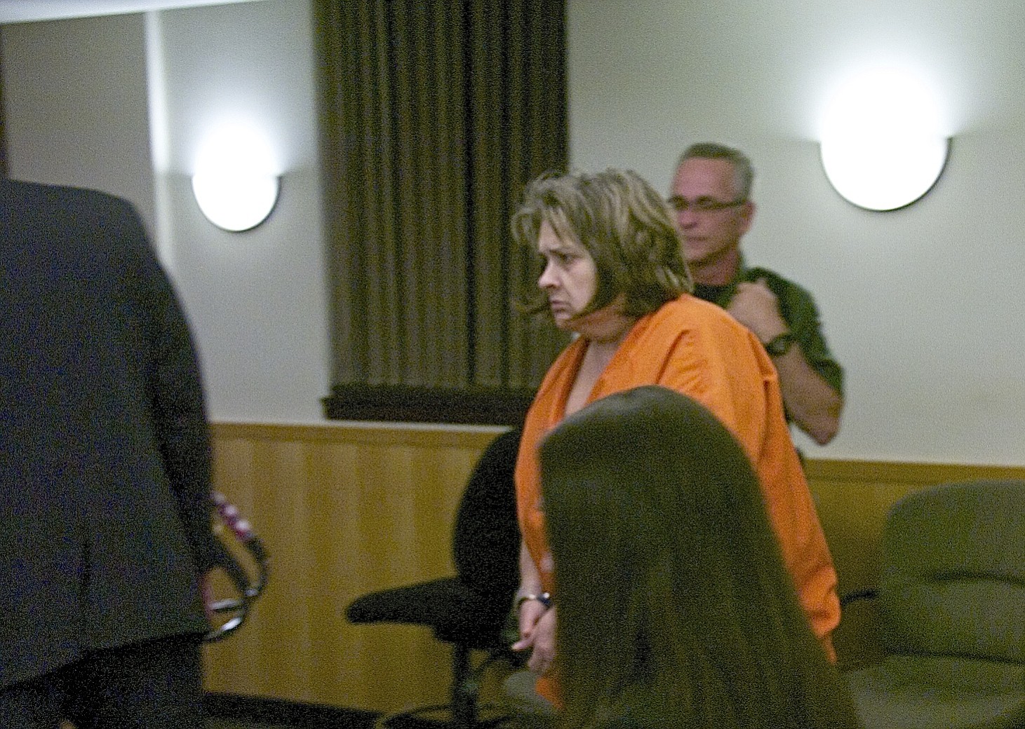 April Blue Colton appears in court Wednesday on charges of manslaughter in the death of her 6-month-old grandson.