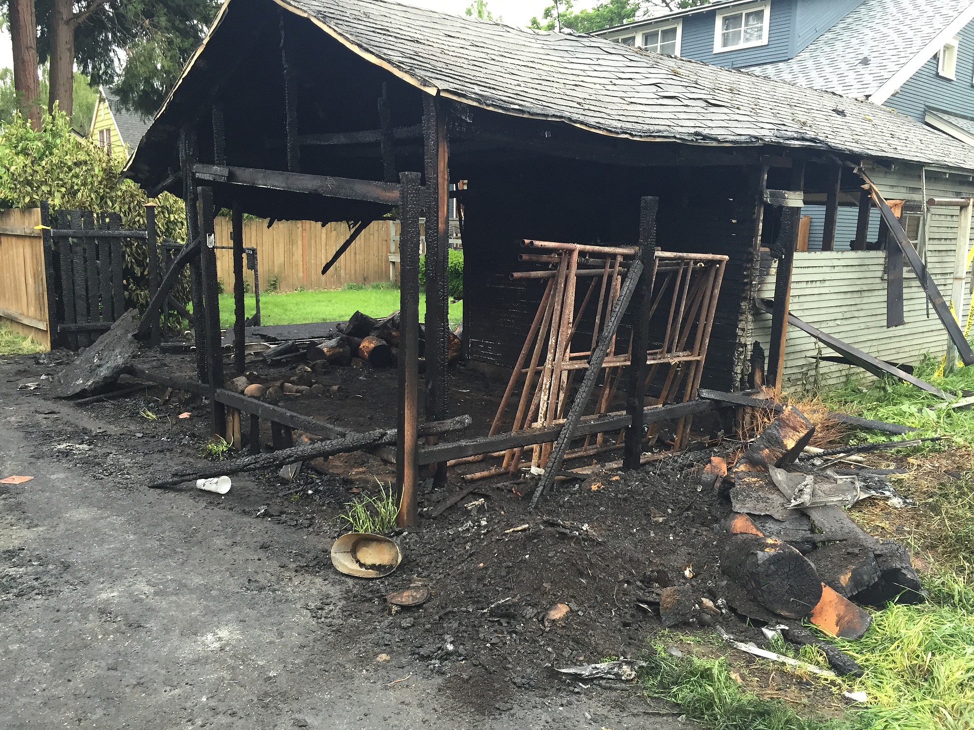 A detached garage was damaged in what investigators are calling a string of 10 arsons late Monday night.