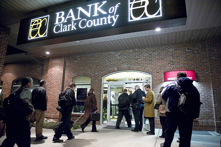 State and federal agents take over Bank of Clark County in January 2009.