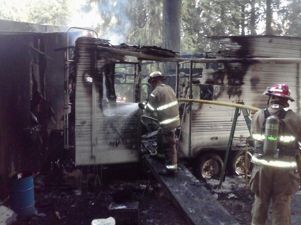 A trailer was destroyed and a cat is missing following a Sunday evening fire in Brush Prairie.