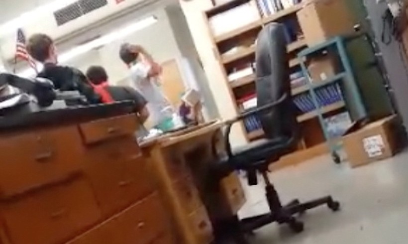 This screen shot of raw video footage shows students allegedly punishing another student in a Stevenson High School classroom. An incident was reported on Oct.