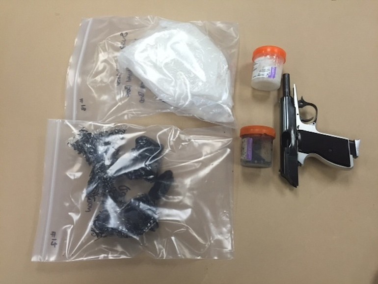 A warrant search at a house in Vancouver's Burnt Bridge Creek neighborhood turned up heroin, methamphetamine and a firearm, Vancouver police say.