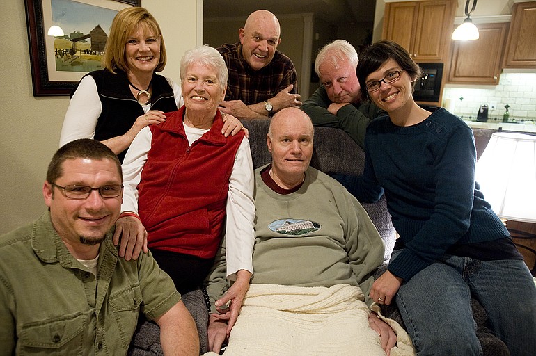 Eric Werts, center, is surrounded by family and friends as he battles ALS.