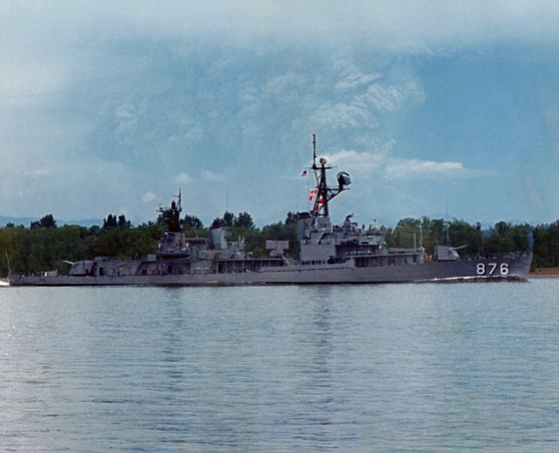 On the morning of May 18, 1980, the USS Rogers makes its way up the Columbia River while coming back from reserve training in San Diego, CA, to its home port of Portland as Mount St.