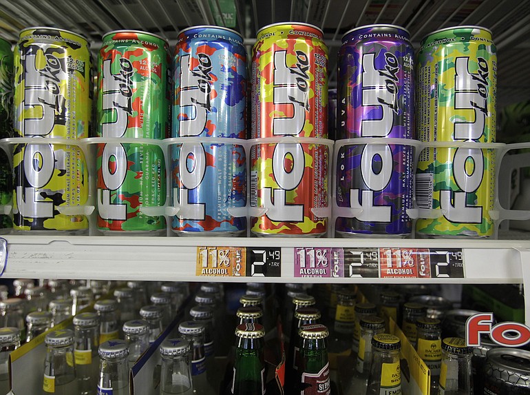 Cans of Four Loko are displayed in a store in Palo Alto, Calif.