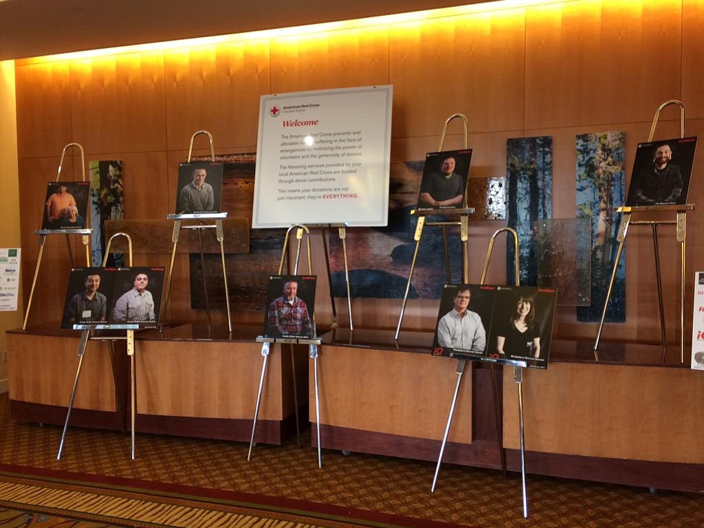 Portraits were displayed outside today's Real Heroes Breakfast at the Hilton Vancouver Washington, a fundraiser for the American Red Cross.
