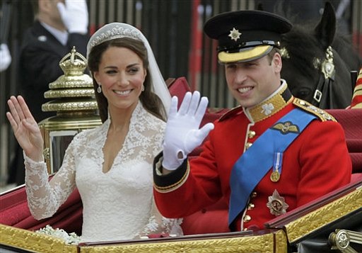 Britain's Prince William and his wife, Kate, Duchess of Cambridge wave April 29 as they leave Westminster Abbey at the Royal Wedding in London.