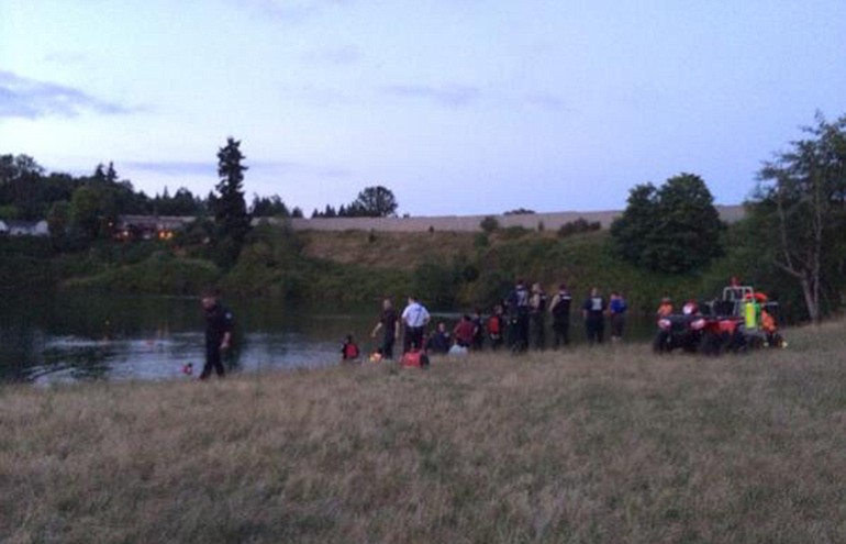 Emergency crews respond to a reported drowning Wednesday evening at Klineline Pond in the Salmon Creek area.