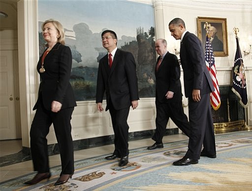 Gary Locke follows Secretary of State Hillary Rodham Clinton out of the room after he was nominated by President Obama Wednesday as the next U.S. ambassador to China.