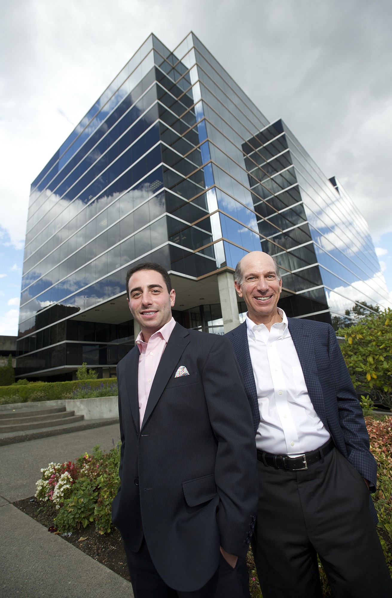 Portland-based property investment firm Menashe Group is purchasing Main Place, at 1111 Main St., in a $12.15 million deal set to close Tuesday. Jordan Menashe, left, led the transaction for the firm headed by his father, Barry Menashe.