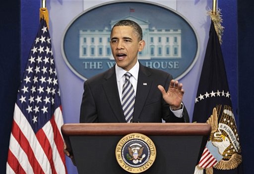 President Barack Obama gestures while speaking to reporters about the controversy over his birth certificate and true nationality, Wednesday, April 27, 2011, at the White House in Washington. (AP Photo/J.